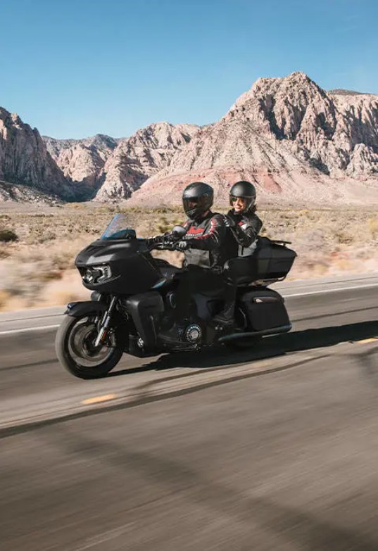 Lineup of Indian PowerPlus motorcycles parked in the desert.