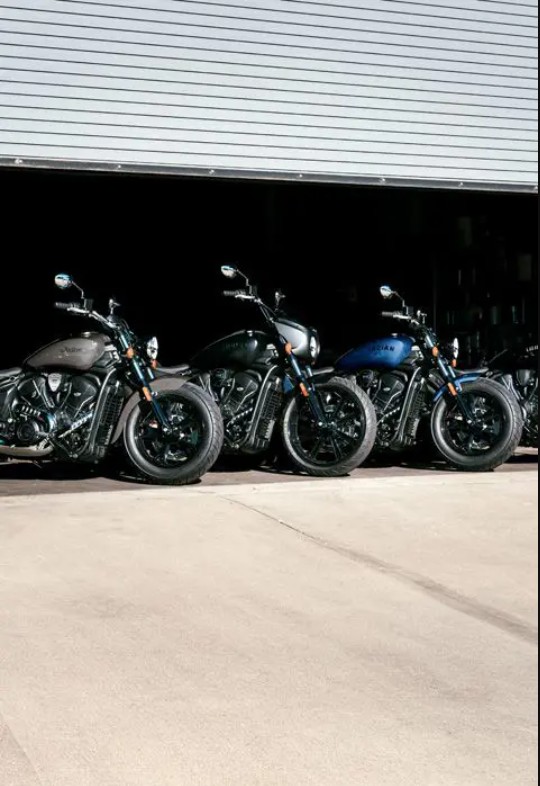 Lineup of Indian PowerPlus motorcycles parked in the desert.