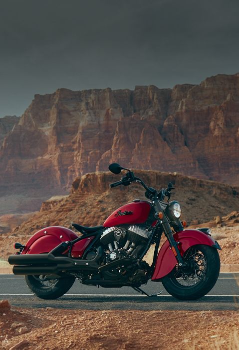 Lineup of Indian PowerPlus motorcycles parked in the desert.